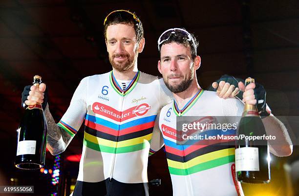 Bradley Wiggins and Mark Cavendish of Great Britain celebrate their second place finish on the Podium after the final of the Six Day London Cycling...