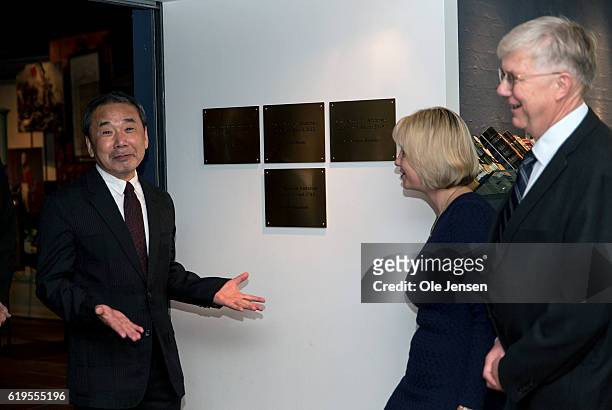 Japanese author Haruki Murakami express's his gratitude for a memorial plaque at the museum of Hans Christian Anderson House in Odense on October 30...