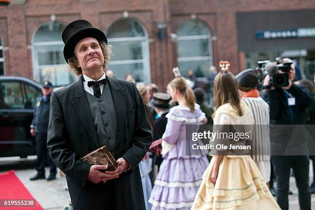 Man acting as the Danish fairy tale author Hans Christian Andersen prior to arrival of Crown Princess Mary and Japanese author Haruki Murakami who is...