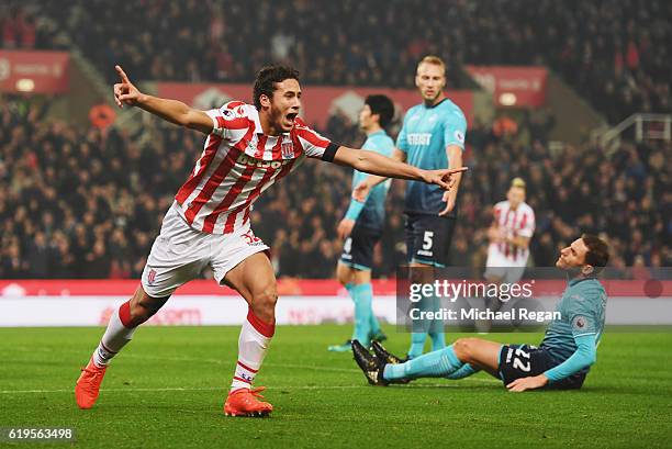 Ramadan Sobhi of Stoke City celebrates as his shot leads to an own goal by Alfie Mawson of Swansea City for their second goal during the Premier...