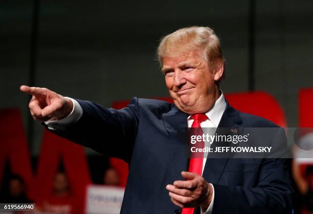 Republican Presidential nominee Donald Trump addresses supporters at Macomb Community College on October 31, 2016 in Warren, Michigan. - Donald Trump...