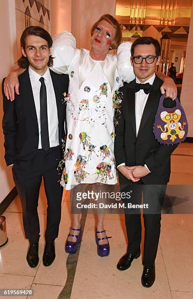 James Righton, Grayson Perry and Erdem Moralioglu attend the Harper's Bazaar Women of the Year Awards 2016 at Claridge's Hotel on October 31, 2016 in...