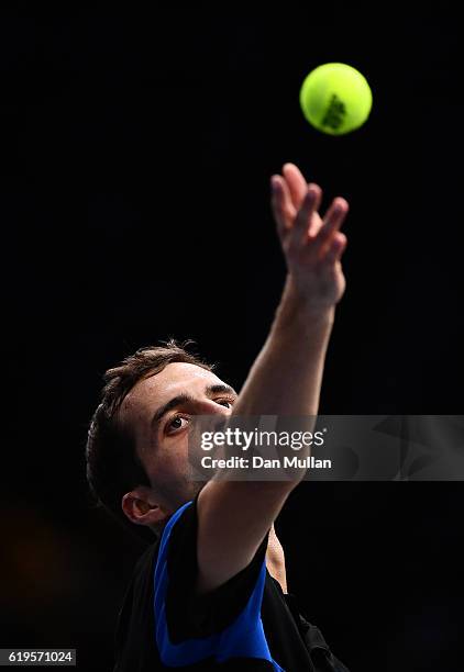 Albert Ramos-Vinolas of Spain serves against Stephane Robert of France during the Mens Singles first round match on day one of the BNP Paribas...