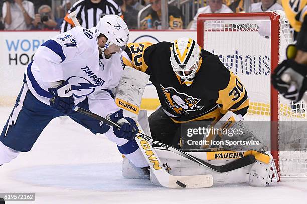 Pittsburgh Penguins goalie Matt Murray makes a save on Tampa Bay Lightning center Alex Killorn during the first period of Game Seven in the 2016 NHL...