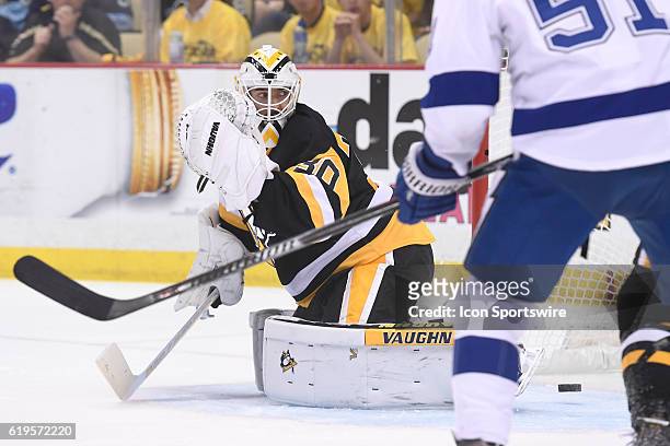 Pittsburgh Penguins goalie Matt Murray looks back as Tampa Bay Lightning left wing Jonathan Drouin puts the puck past him during the second period of...
