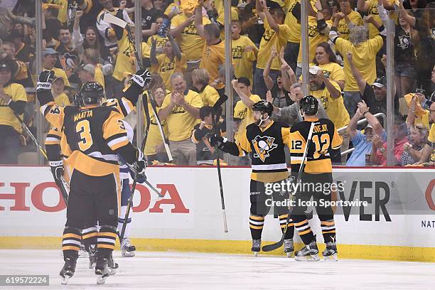 Pittsburgh Penguins right wing Bryan Rust celebrates his goal during the second period of Game Seven in the 2016 NHL Stanley Cup Playoffs Eastern...