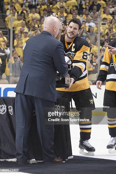 National Hockey League Deputy Commissioner Bill Daly presents the Prince of Wales Trophy to Pittsburgh Penguins center Sidney Crosby . The Pittsburgh...