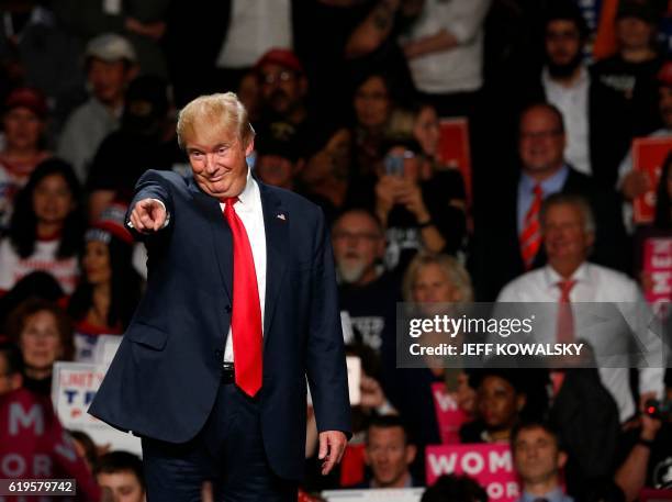 Republican presidential candidate Donald Trump addresses supporters at Macomb Community College on October 31, 2016 in Warren, Michigan.