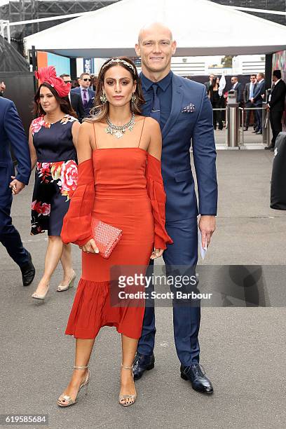 Desiree Deravi and Michael Klim pose at The Birdcage on Melbourne Cup Day at Flemington Racecourse on November 1, 2016 in Melbourne, Australia.