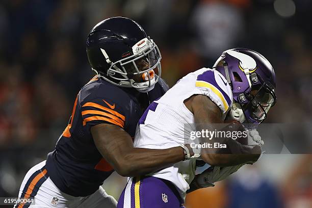 Stefon Diggs of the Minnesota Vikings scores a touchdown as he is defended by De'Vante Bausby of the Chicago Bears during the fourth quarter of their...