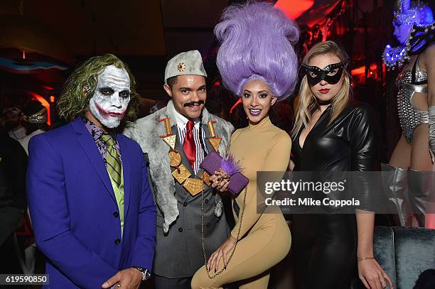Racing driver Lewis Hamilton, comedian Trevor Noah and singer Jordyn Taylor attend Heidi Klum's 17th Annual Halloween Party sponsored by SVEDKA Vodka...