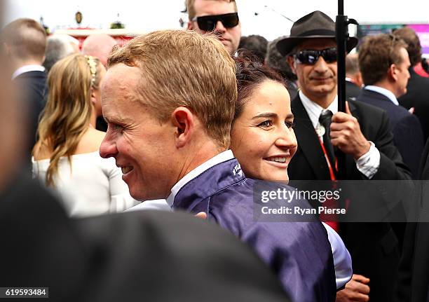 Kerrin McEvoy is congratulated by last years Cup winner Michelle Payne after McEvoy won the Melbourne Cup riding Almandin to win race 7, the Emirates...