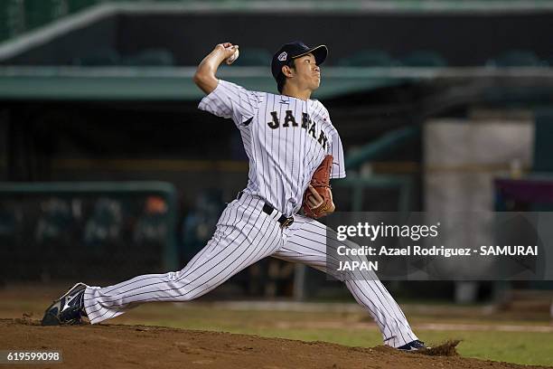 Akiyoshi Katsuno of Japan pitches on the second inning during the WBSC U-23 Baseball World Cup Group B game between Austria and Japan at Estadio de...