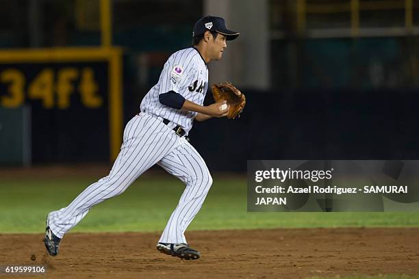 Takumi Miyoshi of Japan handles the ball on the third inning during the WBSC U-23 Baseball World Cup Group B game between Austria and Japan at...