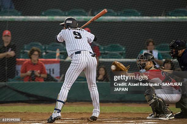 Kengo Takeda of Japan moves out the way of the ball on the first inning during the WBSC U-23 Baseball World Cup Group B game between Austria and...
