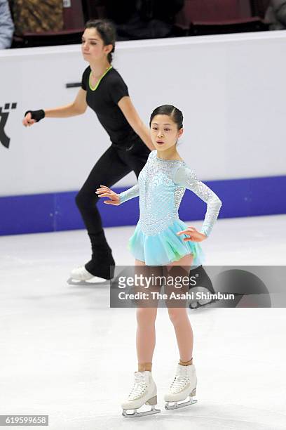 Satoko Miyahara of Japan and Evgenia Medvedeva of Russia are seen prior to the Women's Singles Short Program during day one of the 2016 Skate Canada...