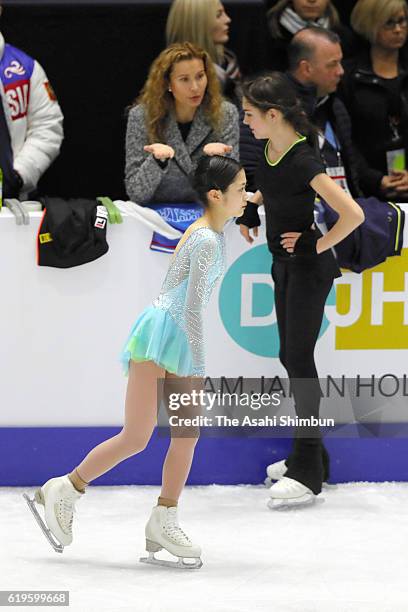 Satoko Miyahara of Japan and Evgenia Medvedeva of Russia are seen prior to the Men's Singles Short Program during day one of the 2016 Skate Canada...