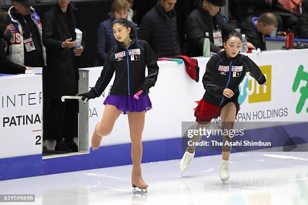 Yuka Nagai and Rika Hongo of Japan are seen prior to the Women's Singles Short Program during day one of the 2016 Skate Canada International at...