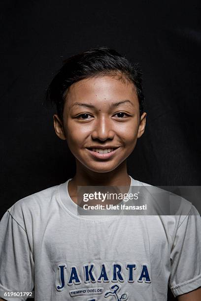 Transvestite Avi , poses to photograph before performing a traditional dance opera known as Ludruk on October 29, 2016 in Surabaya, Indonesia....