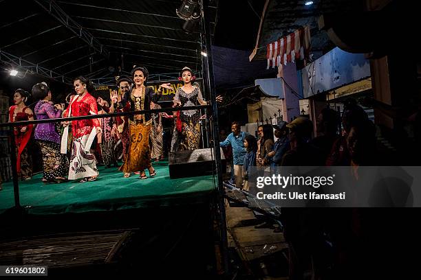 Transvestites perform Bedayan dance as a part of traditional dance opera known as Ludruk on October 30, 2016 in Surabaya, Indonesia. Indonesia's LGBT...