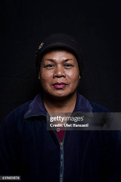 Transvestite Lamiyati , poses to photograph before performing a traditional dance opera known as Ludruk on October 30, 2016 in Surabaya, Indonesia....