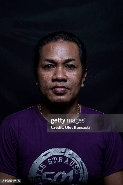 Transvestite Yanti , poses to photograph before performing a traditional dance opera known as Ludruk on October 29, 2016 in Surabaya, Indonesia....