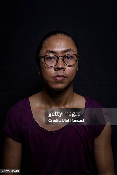Transvestite Arimbi , poses to photograph before performing a traditional dance opera known as Ludruk on October 30, 2016 in Surabaya, Indonesia....