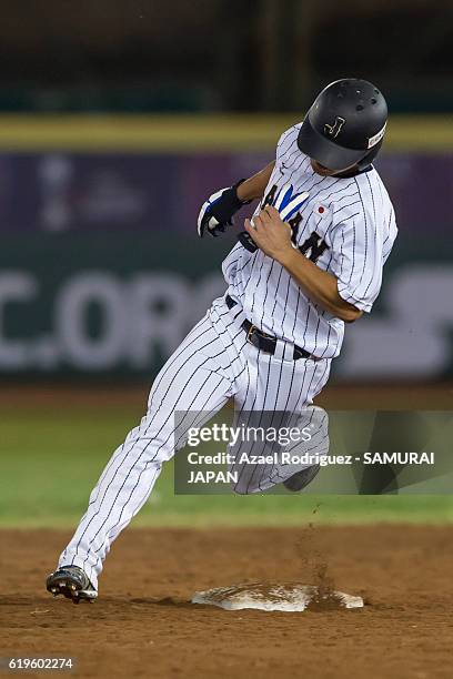 Koki Yamashita of Japan runs over second base on the fourth inning during the WBSC U-23 Baseball World Cup Group B game between Austria and Japan at...