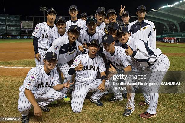 Players of Japan pose at the end of the WBSC U-23 Baseball World Cup Group B game between Austria and Japan at Estadio de Beisbol Francisco I. Madero...