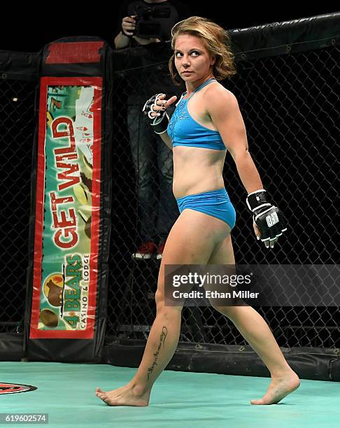 Fighter Andreea "The Storm" Vladoi looks across the cage during her match against Jolene "The Valkyrie" Hexx as they compete during Lingerie Fighting...