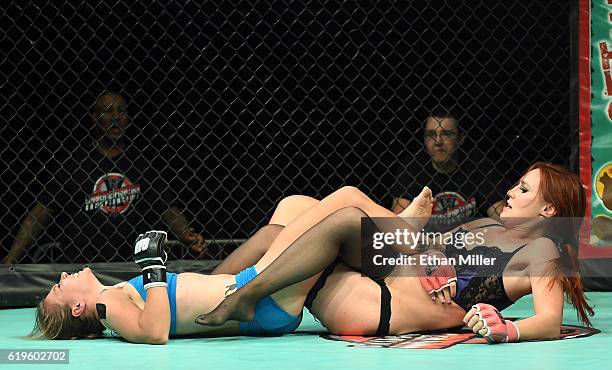 Fighters Andreea "The Storm" Vladoi and Jolene "The Valkyrie" Hexx compete during Lingerie Fighting Championships 22: Costume Brawl I" at 4 Bears...