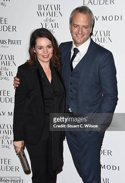Olivia Colman and Ed Sinclair attend Harper's Bazaar Women Of The Year Awards at Claridge's Hotel on October 31, 2016 in London, England.