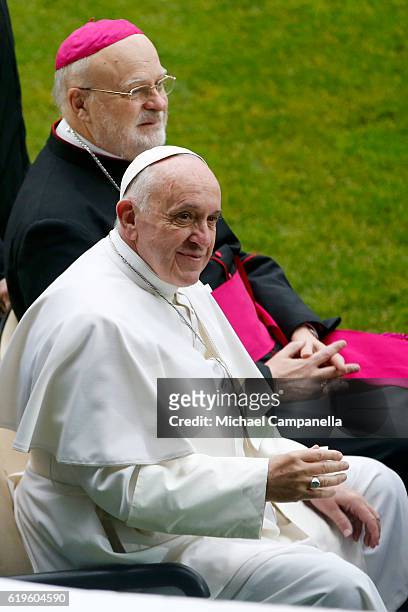 Pope Francis and Sweden's Catholic bishop Anders Arborelius arrive for the Holy Mass at the Swedbank Stadion on November 1, 2016 in Malmo, Sweden....