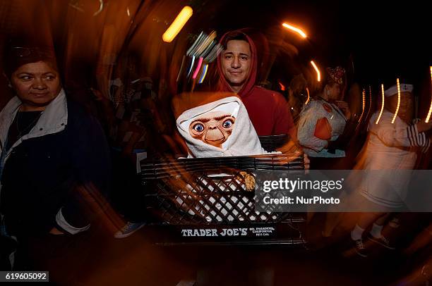 Attendees at the West Hollywood Halloween Carnaval - known as the world's largest Halloween street party. West Hollywood, California. October 31,...