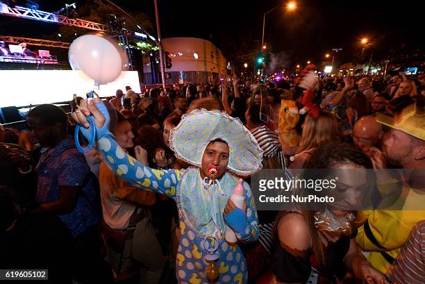 Attendees at the West Hollywood Halloween Carnaval - known as the world's largest Halloween street party. West Hollywood, California. October 31,...