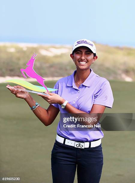 Aditi Ashok of India pose for a picture after winning the nearest to the pin bunker challenge ahead of the Fatima Bint Mubarak Ladies Open at...