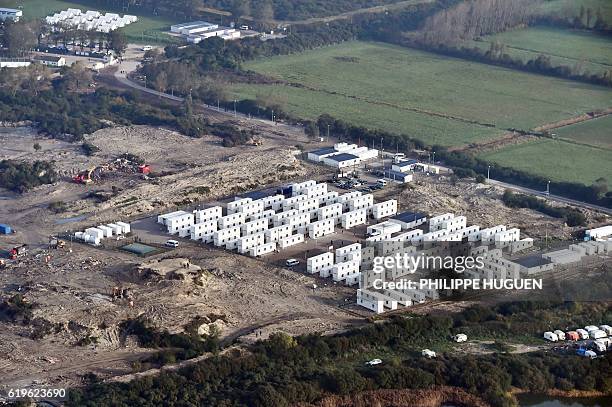 An aerial view taken on November 1, 2016 in Calais shows the temporary reception centre housing minors in the settlement known as the "Jungle" Calais...