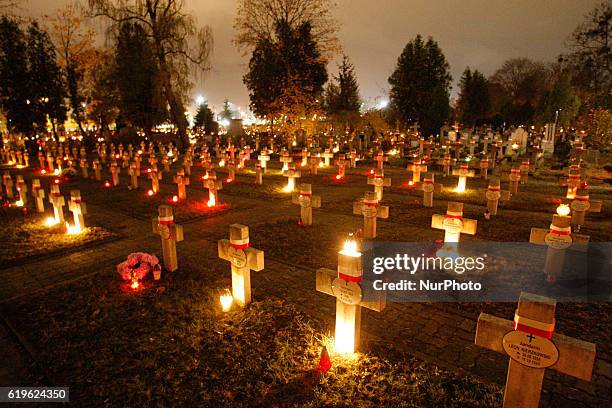 Cemetery in Bydgoszcz, Poland, on 31 October 2016, is seen lighted by hundreds of candles during the vigil of All Souls which takes place on November...