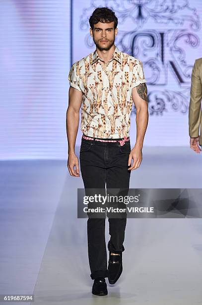 Model walks the runway during the Samuel Cirnansk show at Sao Paulo Fashion Week Fall/Winter 2017 on October 27, 2016 in Sao Paulo, Brazil.