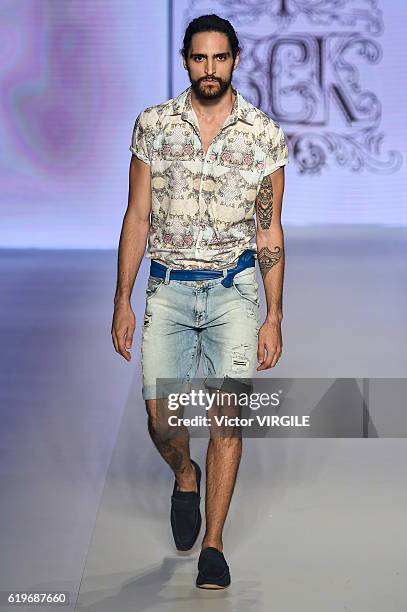 Model walks the runway during the Samuel Cirnansk show at Sao Paulo Fashion Week Fall/Winter 2017 on October 27, 2016 in Sao Paulo, Brazil.