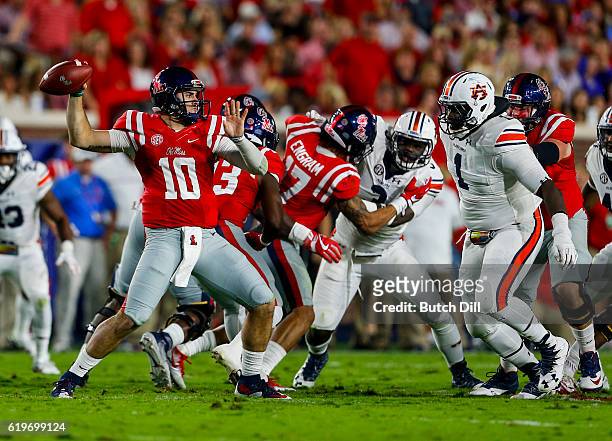 Quarterback Chad Kelly of the Mississippi Rebels throws a pass during the first half of an NCAA college football game against the Auburn Tigers on...