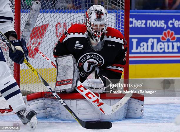 Evgeny Kiselev of the Quebec Remparts makes a save against the Rimouski Oceanic during their QMJHL hockey game at the Centre Videotron on October 28,...