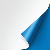 Curled corner of White paper on Blue Background