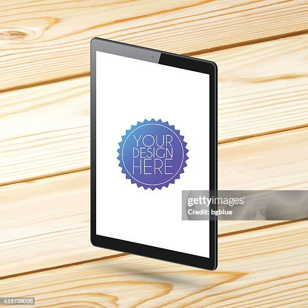 tablet pc with blank screen on wooden background - ipad mockup on table stock illustrations