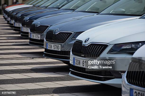 skoda superb cars on the parking - skoda auto stock pictures, royalty-free photos & images