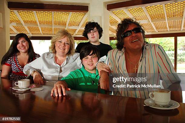 Melissa Feliciano, Susan Feliciano, Michael Feliciano, John Feliciano and Jose Feliciano Family Portrait at Raffles Resort Canouan Island at Raffles...