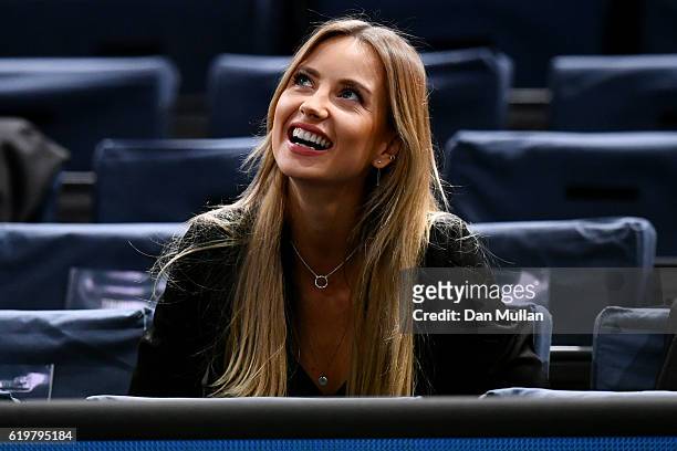 Ester Satorova, the wife of Tomas Berdych of the Czech Republic, watches his men's singles second round match against Joao Sousa of Portugal on day...