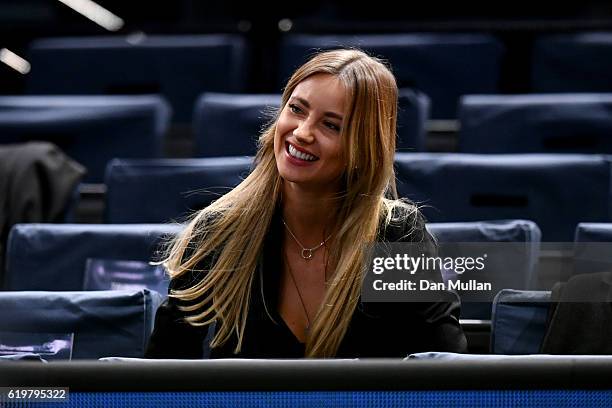 Ester Satorova, the wife of Tomas Berdych of the Czech Republic, watches his men's singles second round match against Joao Sousa of Portugal on day...