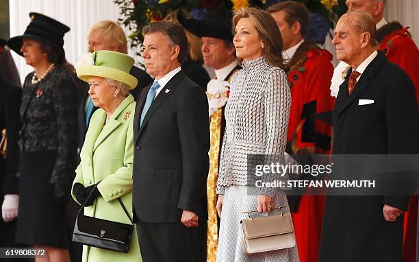 Britain's Queen Elizabeth II, Colombia's President Juan Manuel Santos, Britain's Prince Philip, Duke of Edinburgh and first lady Maria Clemencia de...