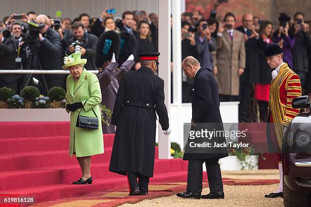 Queen Elizabeth II and Prince Philip, Duke of Edinburgh arrive at the royal pavilion for the Official Ceremonial Welcome for the Colombian State...